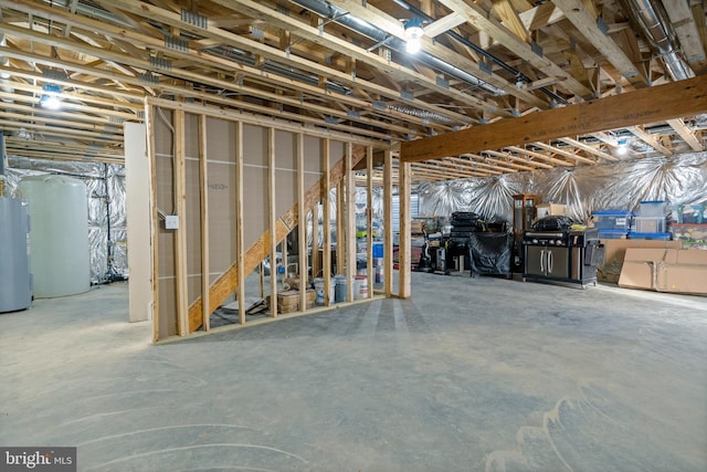 basement featuring electric water heater