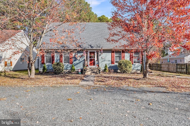 1221 Washington, Saint Michaels, MD 21663 - view of front facade featuring a shingled roof