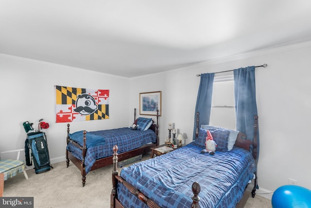 carpeted bedroom featuring ornamental molding