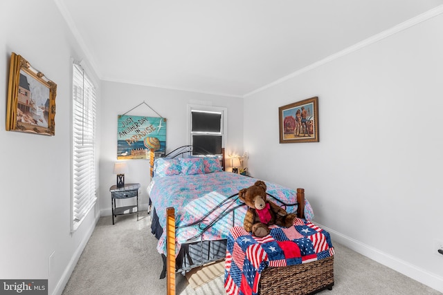 bedroom with carpet flooring and crown molding