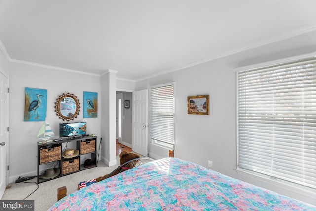 bedroom with light colored carpet, multiple windows, and crown molding