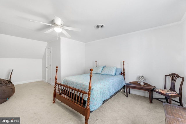 bedroom with ornamental molding, light colored carpet, ceiling fan, and lofted ceiling