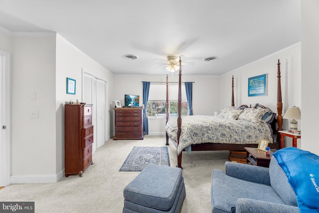 bedroom featuring ceiling fan, light colored carpet, and ornamental molding