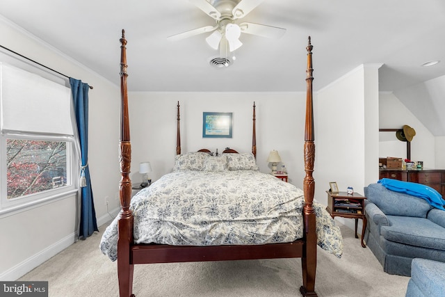 carpeted bedroom featuring ceiling fan, lofted ceiling, and ornamental molding