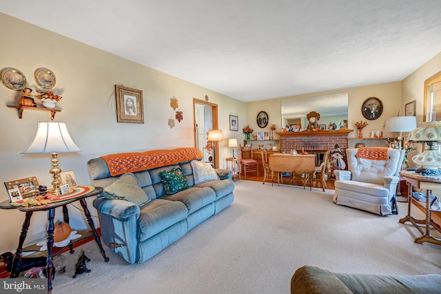 carpeted living room with a fireplace