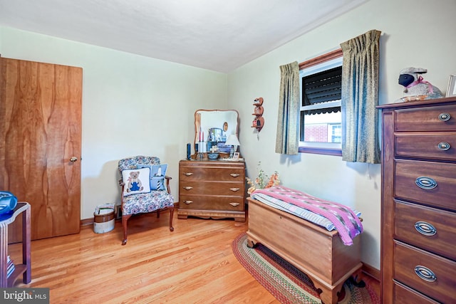 bedroom with light wood-type flooring