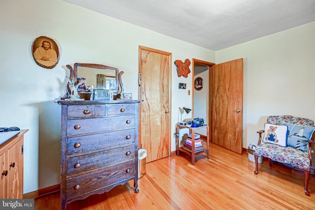 sitting room featuring hardwood / wood-style flooring