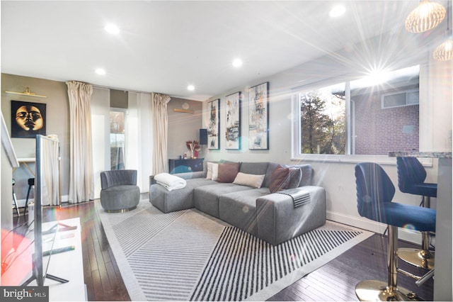 living room with dark wood-type flooring