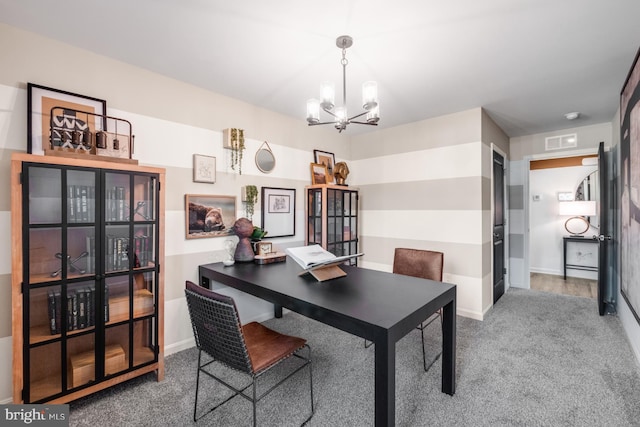 carpeted dining space with a chandelier