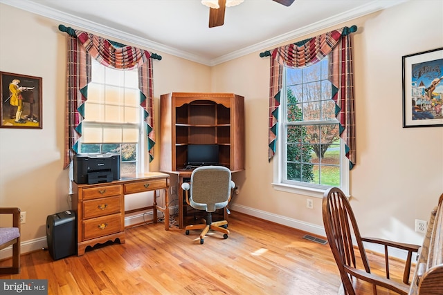 office with light wood-type flooring, ceiling fan, and ornamental molding