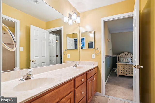 bathroom featuring tile patterned floors and vanity