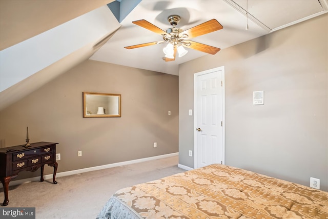 carpeted bedroom with ceiling fan and lofted ceiling