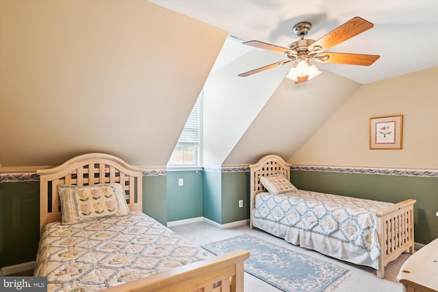 bedroom with ceiling fan, light colored carpet, and lofted ceiling