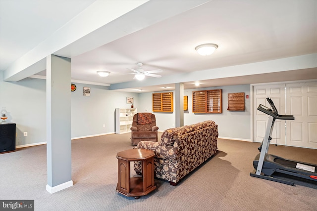 exercise room with carpet floors and ceiling fan