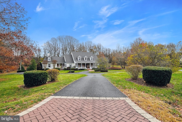 exterior space featuring a front lawn