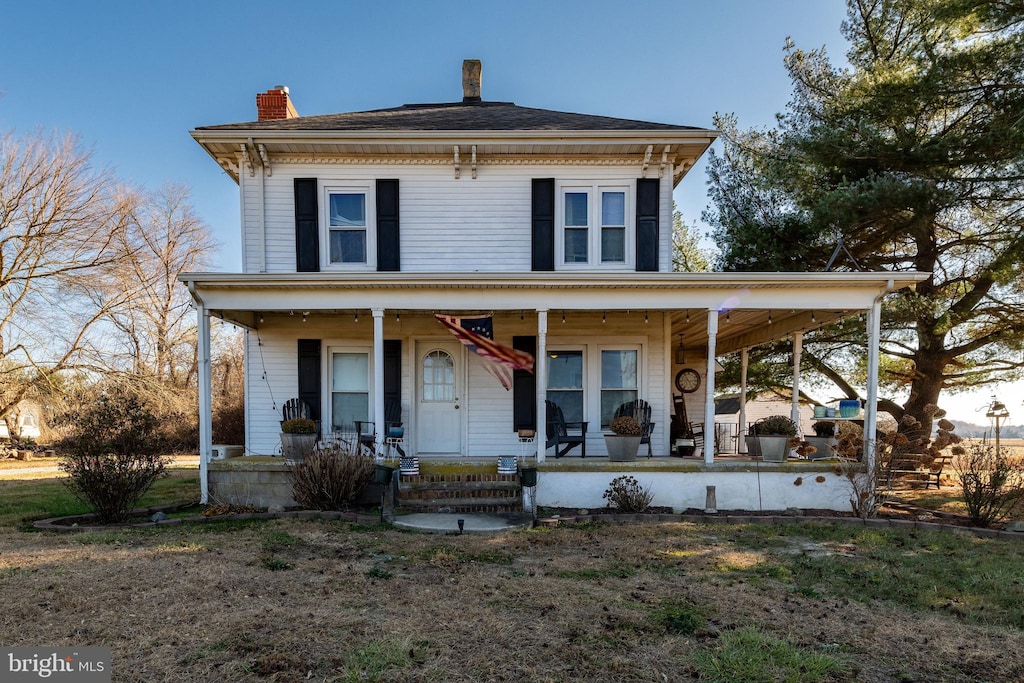 italianate-style house with a porch