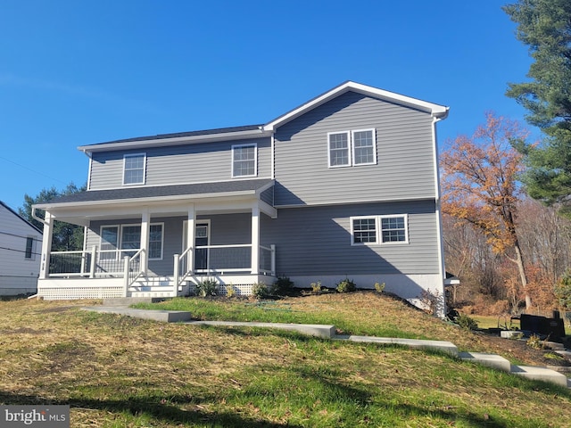 view of front property with a front lawn and a porch