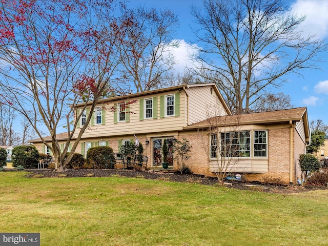 view of front of house with a front lawn