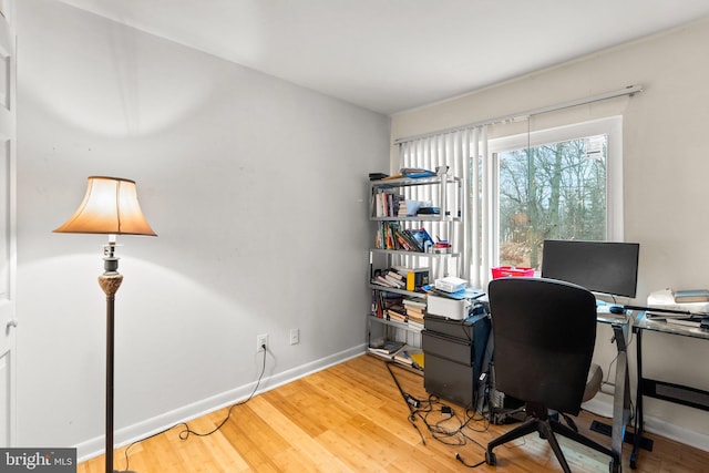 8111 Bird Ln, Greenbelt, MD 20770 - home office with light wood finished floors and baseboards