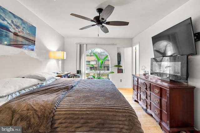 8111 Bird Ln, Greenbelt, MD 20770 - bedroom with access to exterior, light wood-style flooring, and ceiling fan