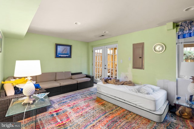 8111 Bird Ln, Greenbelt, MD 20770 - living area featuring electric panel, french doors, and recessed lighting
