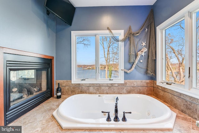 bathroom with tiled tub