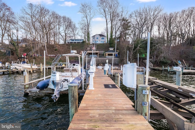 view of dock featuring a water view