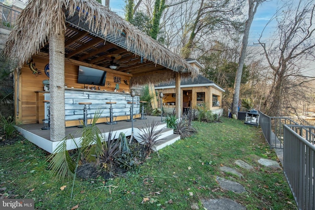 view of yard featuring ceiling fan