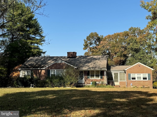 14423 Long Branch Rd, Woodford, VA 22580 - view of front of house featuring brick siding, a front yard, and a chimney