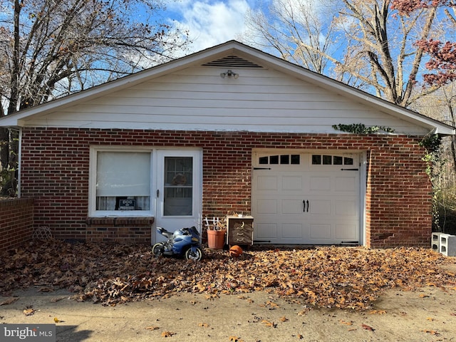 exterior space featuring a garage