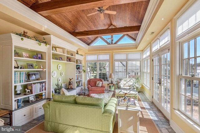 sunroom / solarium with ceiling fan, wooden ceiling, and a wealth of natural light