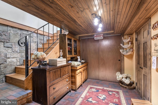 interior space featuring wooden ceiling