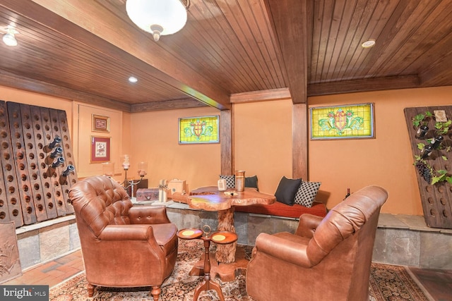 living room with beamed ceiling, bar area, and wood ceiling