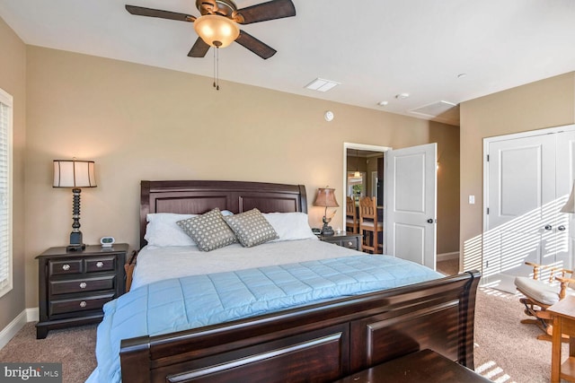 carpeted bedroom with ceiling fan