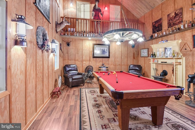 game room featuring high vaulted ceiling, billiards, light hardwood / wood-style floors, wooden walls, and wood ceiling