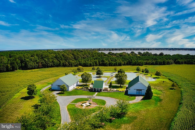 birds eye view of property with a rural view and a water view