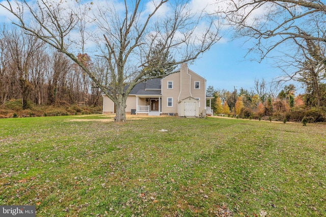 exterior space with a yard and a porch