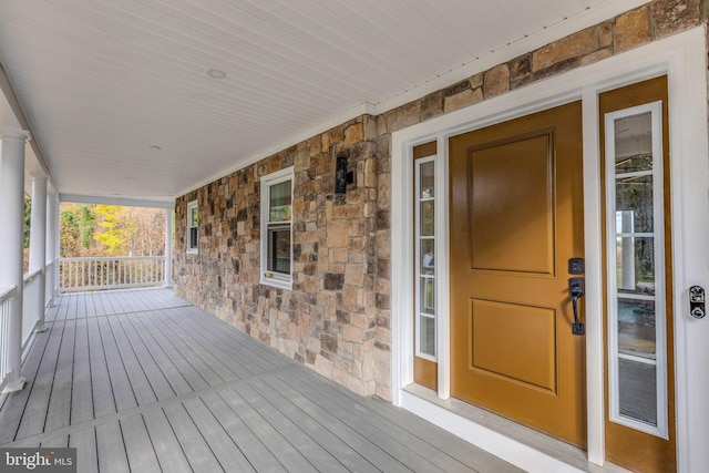 wooden deck featuring a porch