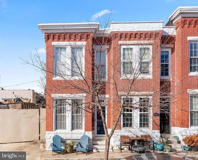 back of property with a patio area