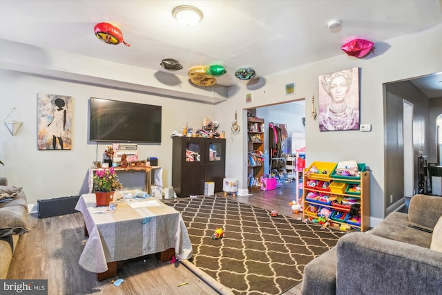 playroom featuring dark hardwood / wood-style flooring