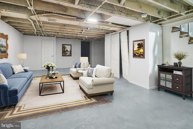 living room with concrete floors