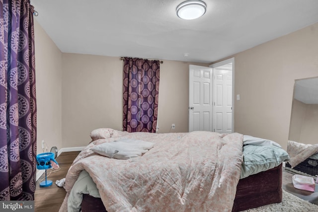 bedroom featuring hardwood / wood-style floors