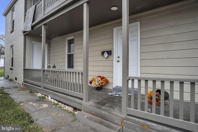 entrance to property with a porch