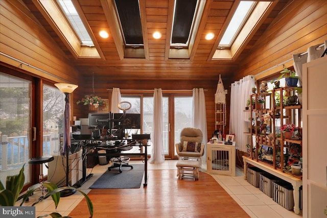 tiled office with wood walls, french doors, wood ceiling, and vaulted ceiling