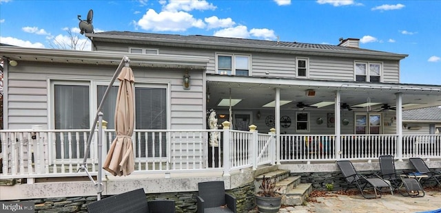 back of house featuring ceiling fan