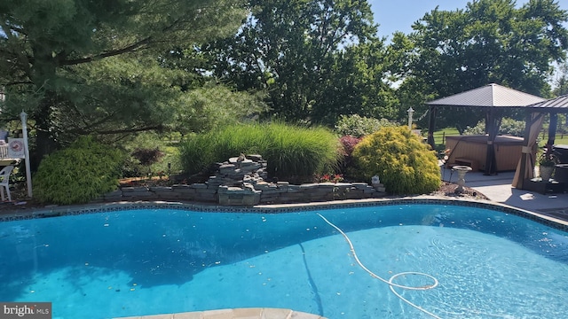 view of pool featuring a gazebo