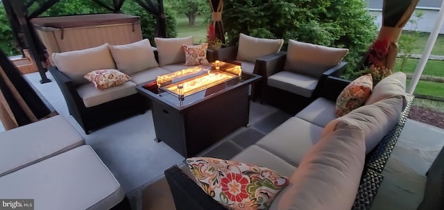 exterior space with an outdoor living space with a fire pit