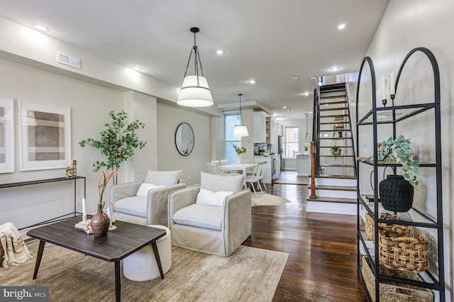 living room with dark wood-type flooring