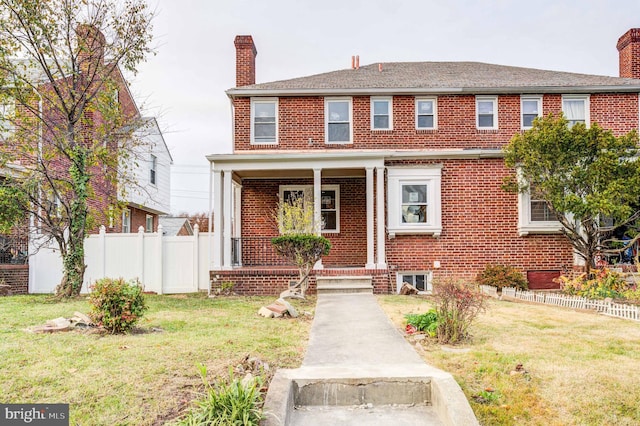 view of front of house with a front lawn