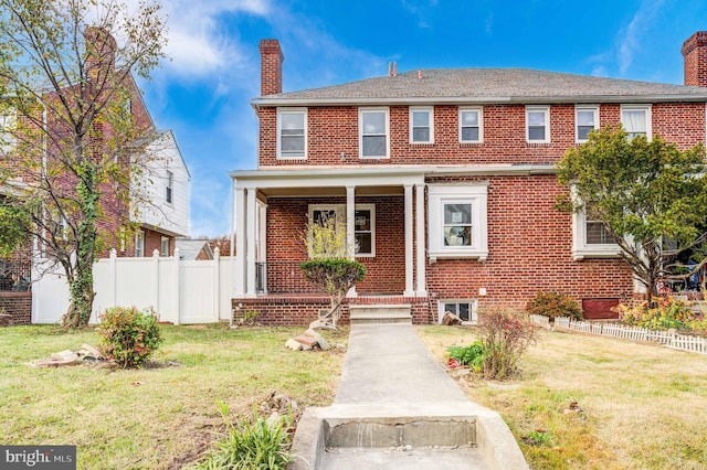 view of front of house with a front lawn